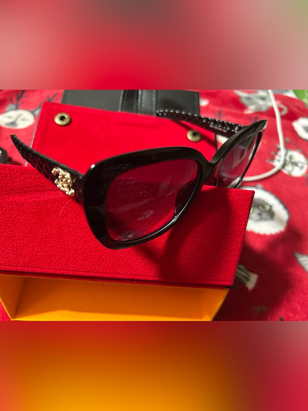 Black Sunglasses with Gold Logo